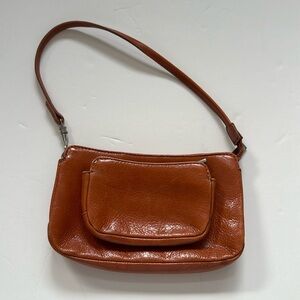 Hobo Small wristlet rust brown.